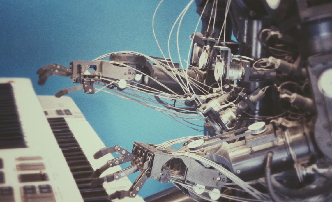 artistic creation robot playing piano